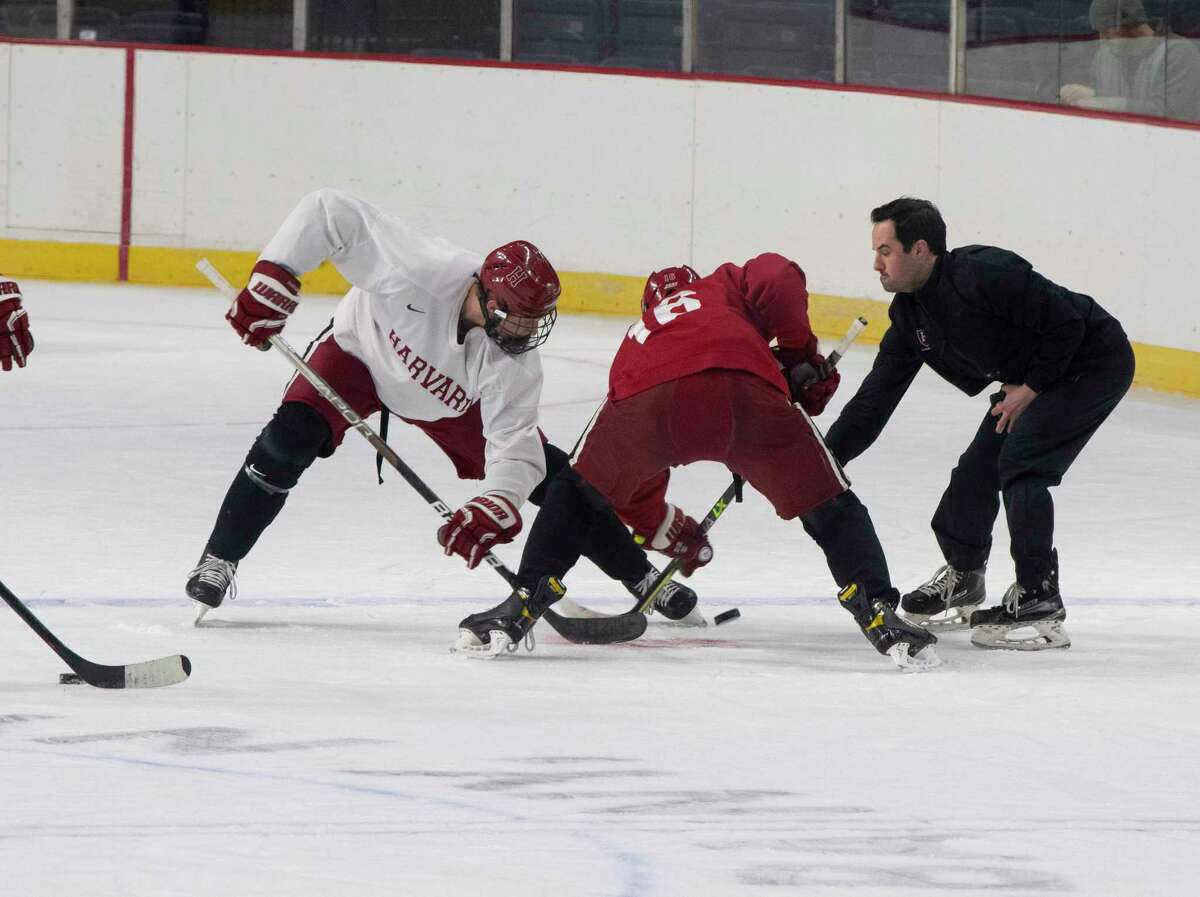 Harvard hockey players practice for their game against Minnesota State in the NCAA game at the MVP Arena on Wednesday, March 23, 2022 in Albany, N.Y.
