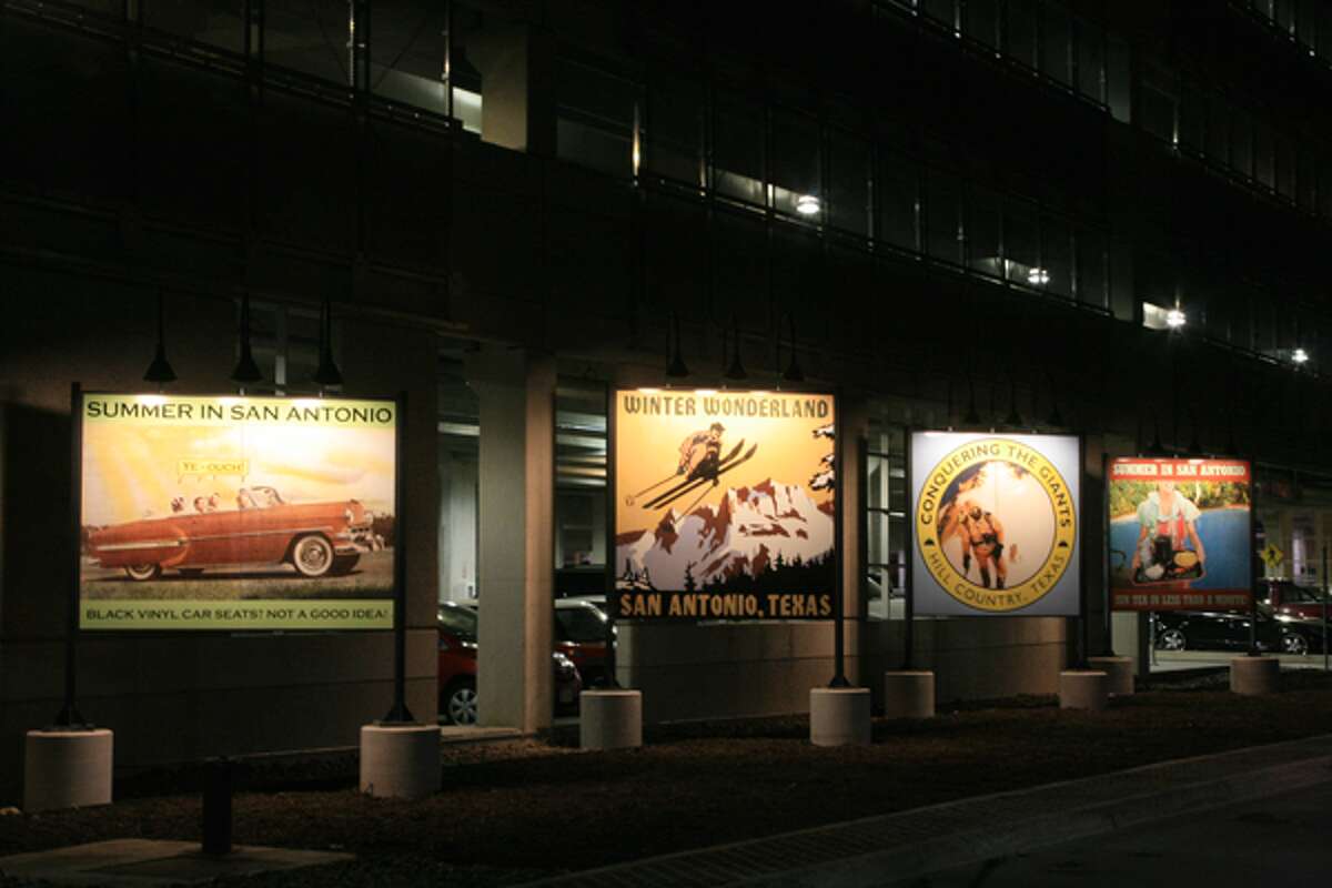 Dubbed “Nostalgic, Texas,” the eight billboards jut out of the long-term parking garage at the San Antonio International Airport. They were designed by artist Gary Sweeney and meant to poke fun at San Antonio and the Hill Country.   
