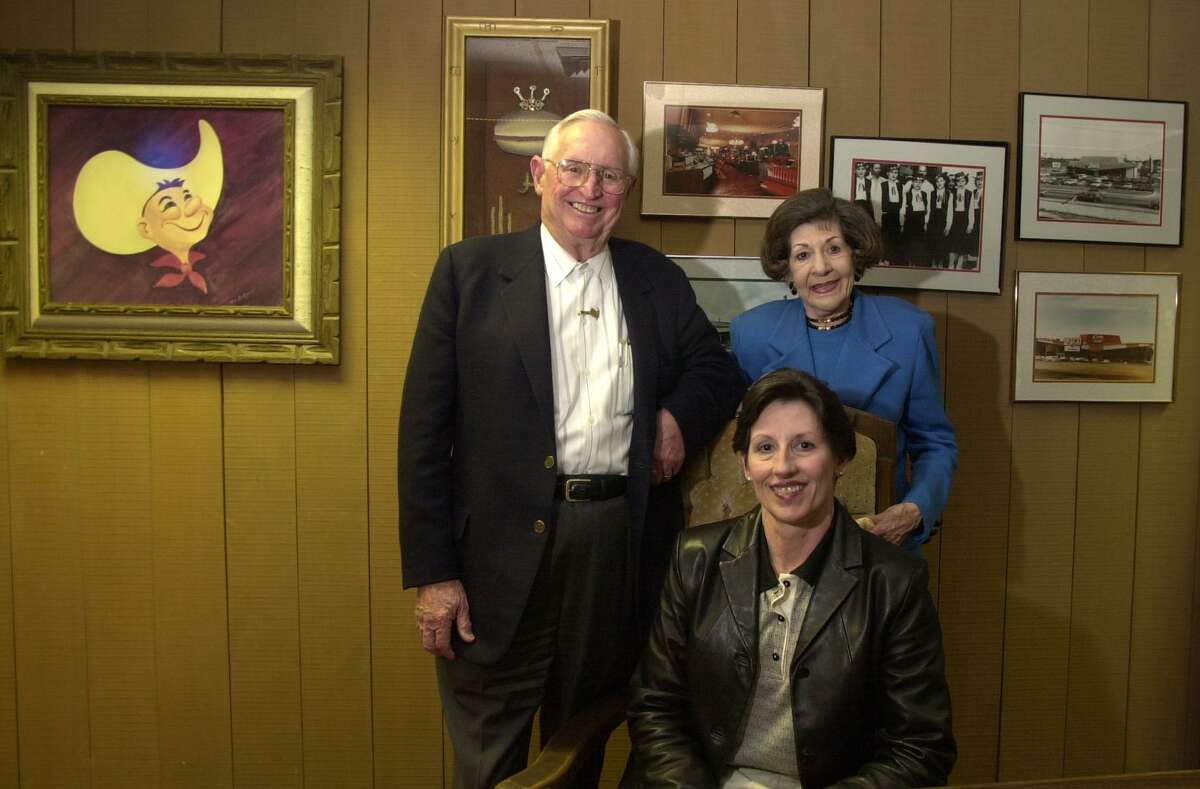 Jim and Veva Hasslocher with their daughter, Susan Hasslocher, at Hasslocher Enterprises Inc.’s headquarters in 2002. Susan and her sister Caryn have sued their brother Jimmy over their father’s estate.