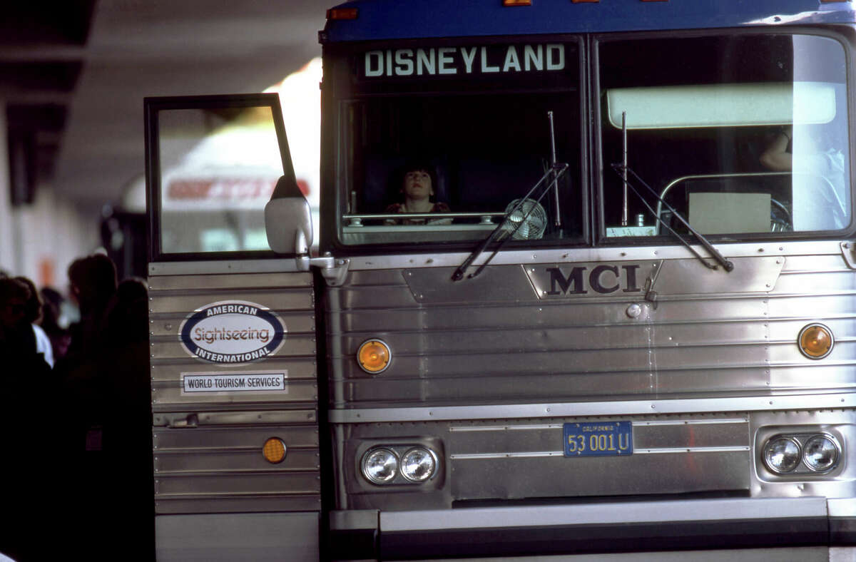 General view of a child sitting on a bus that is headed to Disneyland circa August, 1983 at the Los Angeles International Airport in Los Angeles, California. 
