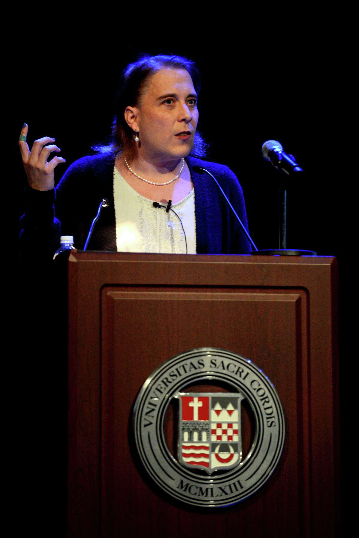 40-game Jeopardy! winner Amy Schneider speaks during a lecture at Sacred Heart University, in Fairfield, Conn. March 23, 2022.