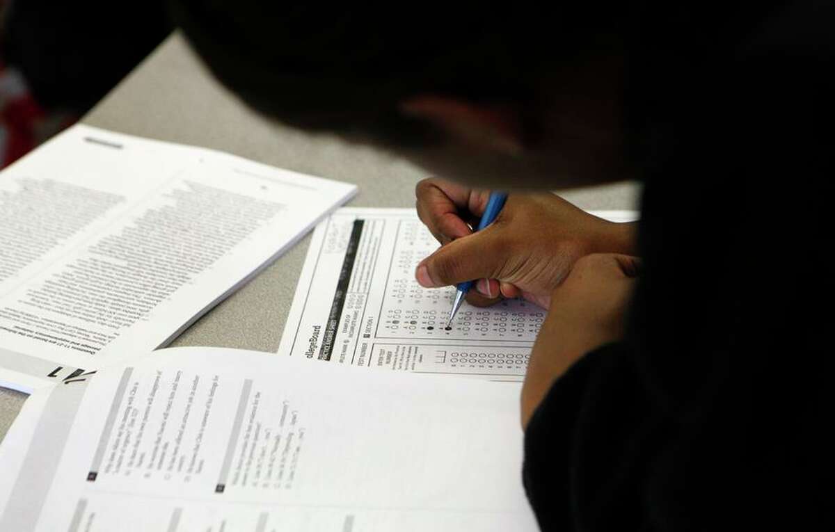 This file photograph shows a student filling out a practice test during an SAT preparation class held at Berkeley High School.