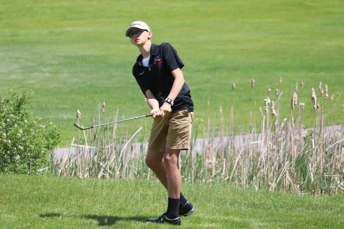 In this file photo, Benzie Central's Drew Warsecke chips during the conference championship at the Grand Traverse Resort.