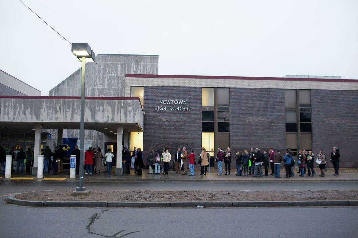 Fights at Newtown High School, which led to the arrest of 12 students, began over ‘hearsay,’ according to police.