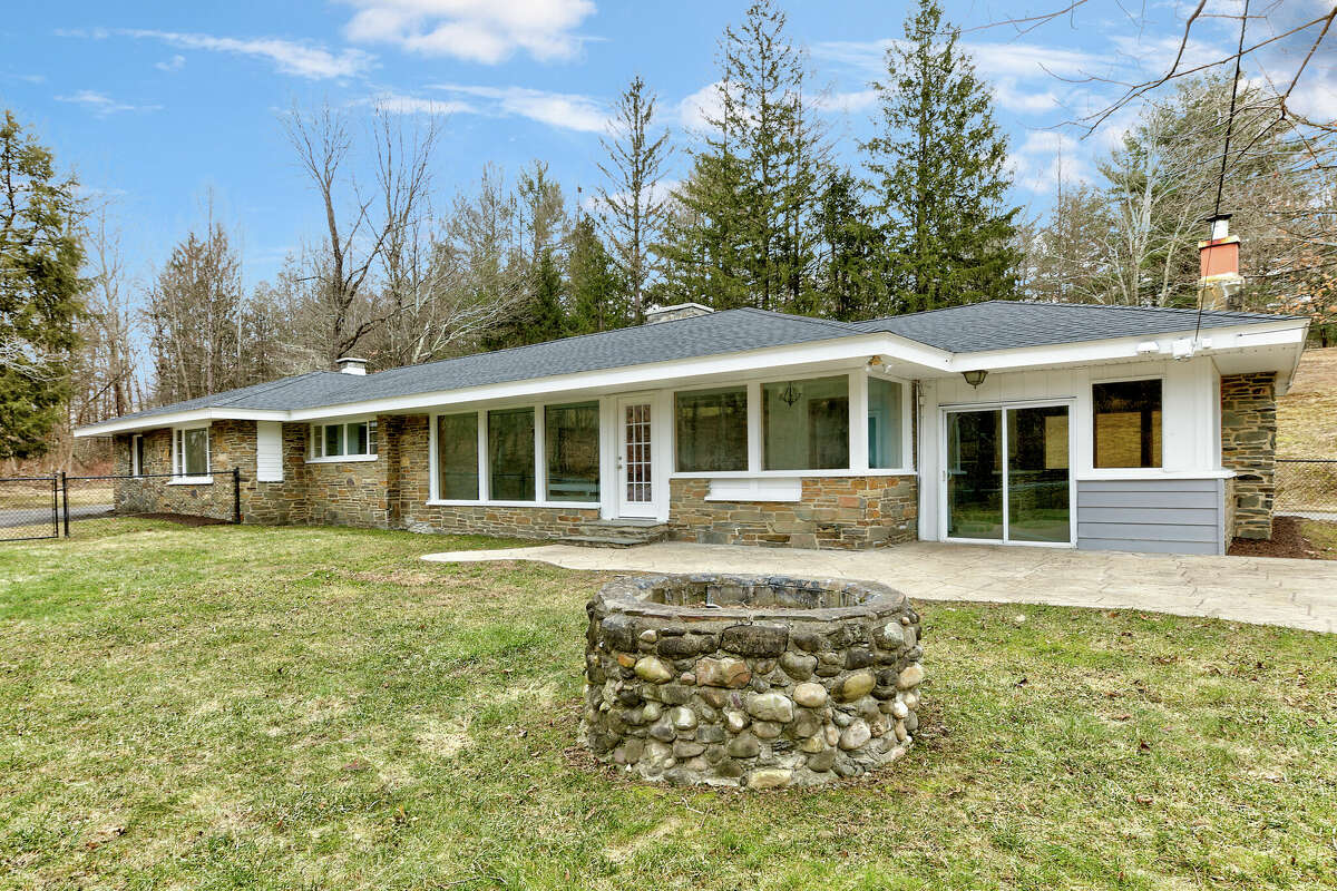This week’s house is a ranch-style home on 99 acres in Nassau. The home at 54 Loweree Road was built in 1965 and has been partially renovated. It has a new roof, floor-to-ceiling windows, two fireplaces, four bedrooms and two bathrooms. There are steps from the kitchen to the enclosed porch. A stream runs through the property; there are two ponds, trails and a unique outbuilding on the lot. The owners built a glamping site on the property, a raised platform with a Bell-Tent and an outhouse and shower nearby. East Greenbush schools. Private septic and well. Taxes: $11,000. List price: $750,000. Contact listing agent Daniel Weinheimer of Vera Cohen Realty at 518-300-3265.