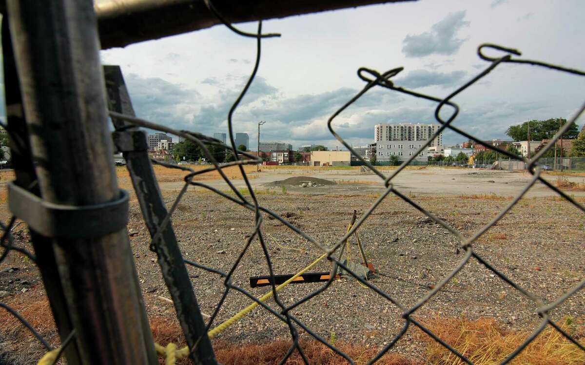 A view of the former B&S Carting site between Walter Wheeler Drive and Woodlawn Avenue in Stamford, Conn., on Thursday July 22, 2021. Developer Building and Land Technology wants to put more apartments on, but residents have fought tooth and nail to discourage the development.