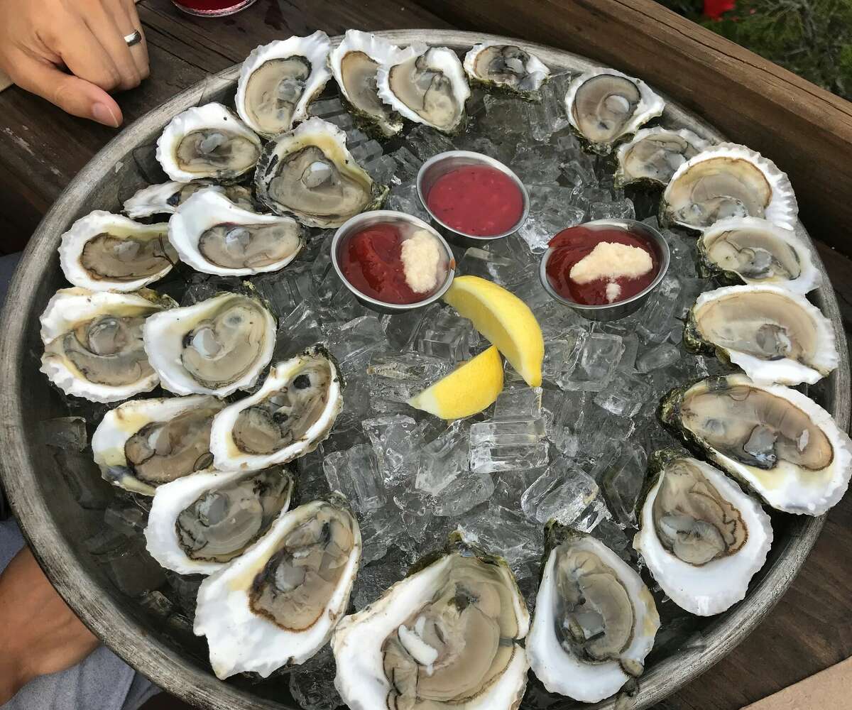 Oysters, served at Oyster Club's Treehouse rooftop deck. 