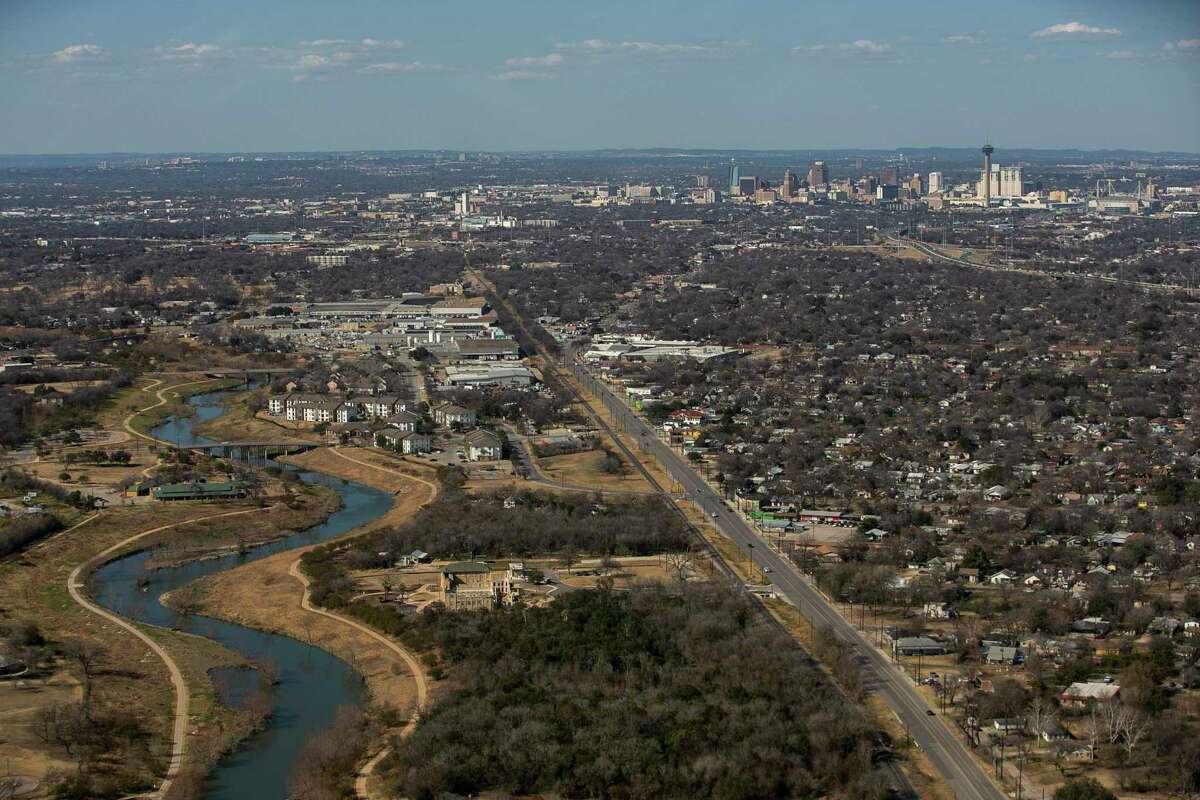 The San Antonio River winds its way towards downtown from the southeast as seen from the air in San Antonio, Texas, on Feb. 10, 2022.