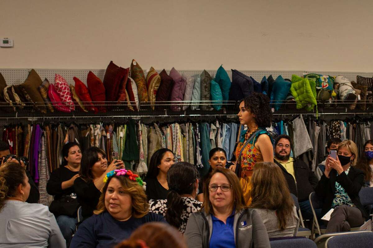 Victoria Garcia walks in the Fiesta Sustainable Fashion Show. Students in Stevens High School’s Entrepreneurship/Fashion Program work with Goodwill to learn about retail and design their own garments. (Kaylee Greenlee Beal/Contributor)
