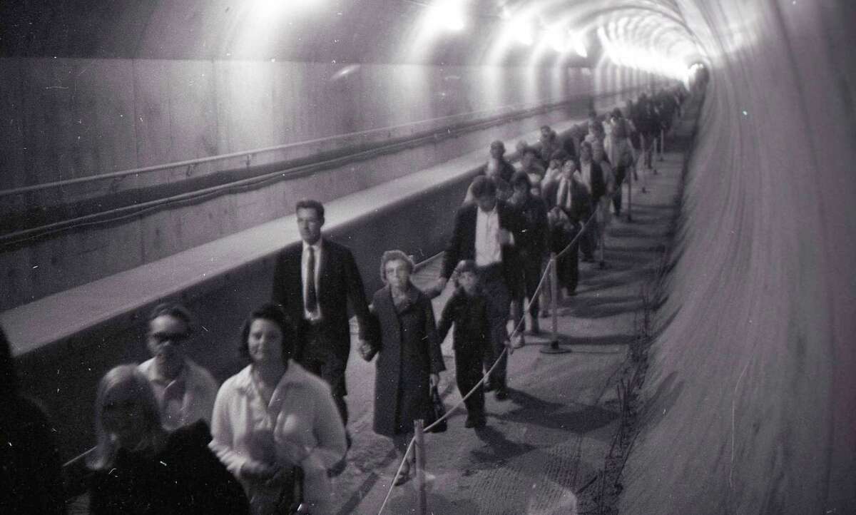 Nov. 9, 1969: Thousands line up to walk in the recently completed BART Transbay Tube, which was briefly opened to pedestrians.