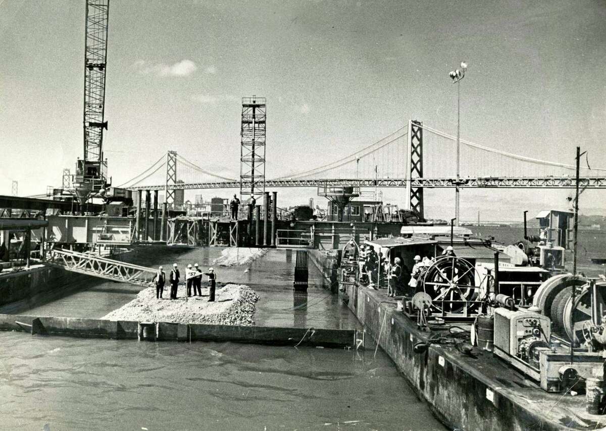 April 3, 1969: BART construction crews lower the 57th and last Transbay Tube section into the San Francisco Bay.