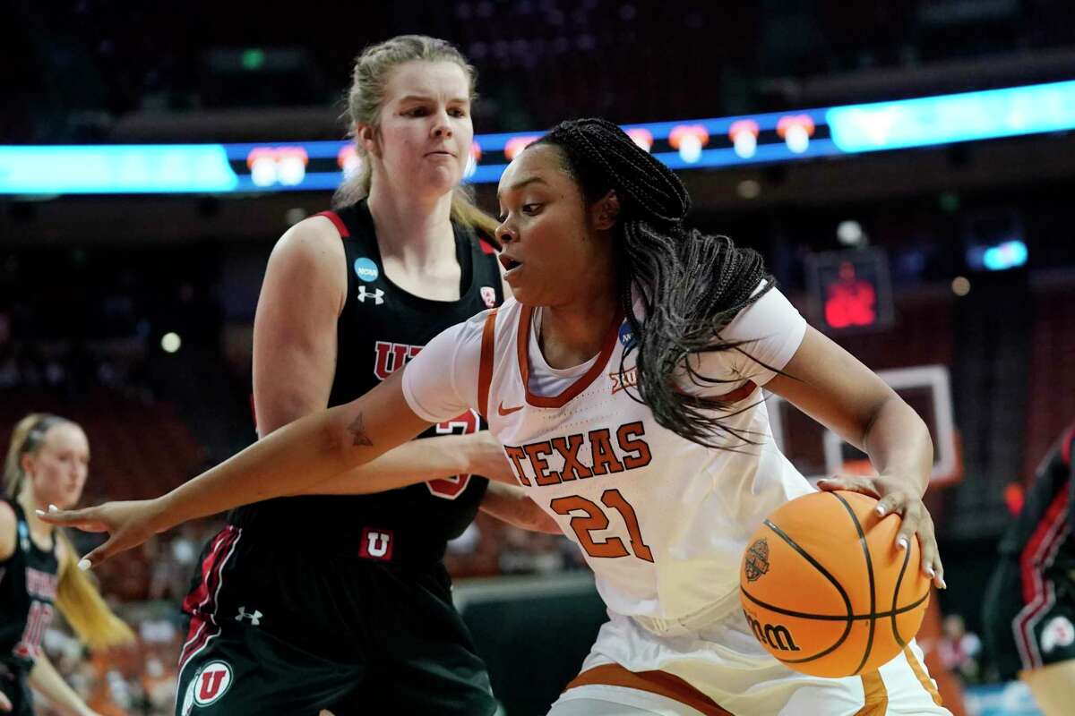 Texas forward Aaliyah Moore drives around Utah forward Kelsey Rees in the Longhorns’ win in the second round of the NCAA Tournament.