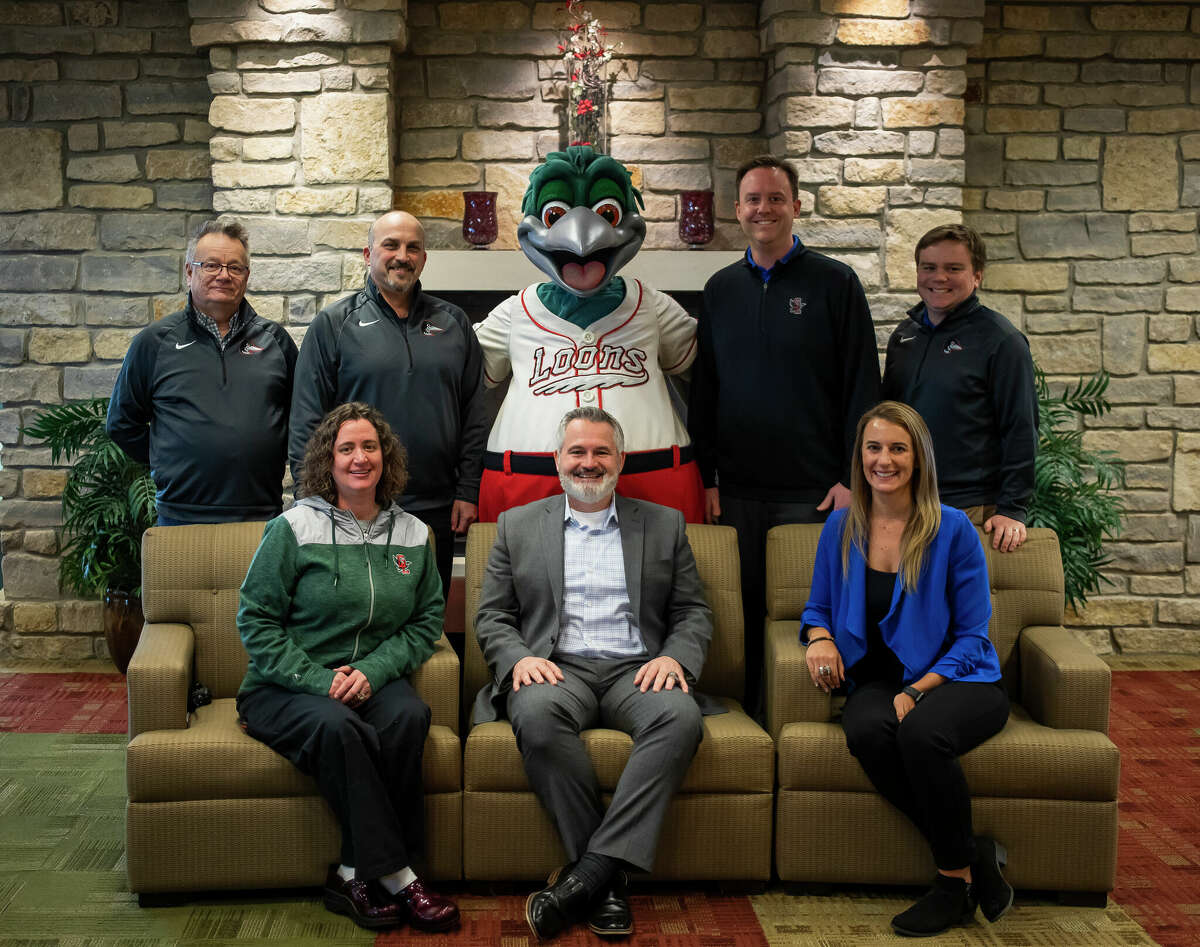 Pictured at Dow Diamond are (back row, from left) Dan Straley, David Gomola, Lou E. Loon, Eric Ramseyer and Tyler Kring; (front row, from left) Andrea Noonan, Chris Mundhenk and Tiffany Wardynski. They have all worked with the Great Lakes Loons for over 10 years.