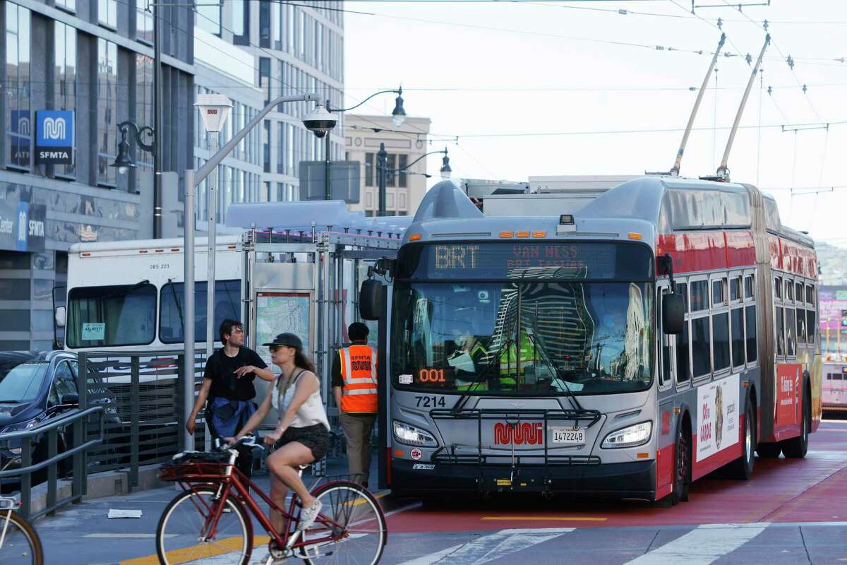 A Muni bus does a test run for San Francisco’s first bus rapid transit system.