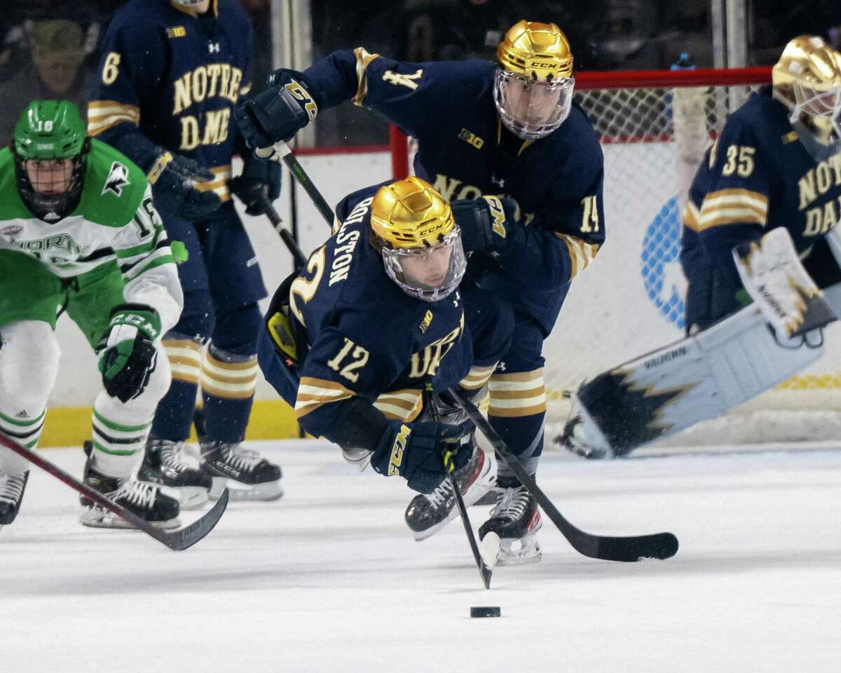 Notre Dame forward Ryder Rolston is tripped up during the NCAA regionals against North Dakota at the MVP Arena in Albany, NY, on Thursday, March 24, 2022. (Jim Franco/Special to the Times Union)