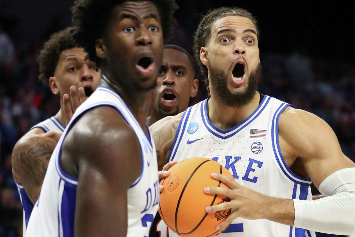 Duke's Theo John and 3 of his teammates react to an official's call while playing Texas Tech in 2nd half of NCAA Men's Basketball West Regional semifinal at Chase Center in San Francisco, Calif., on Thursday, March 24, 2022.