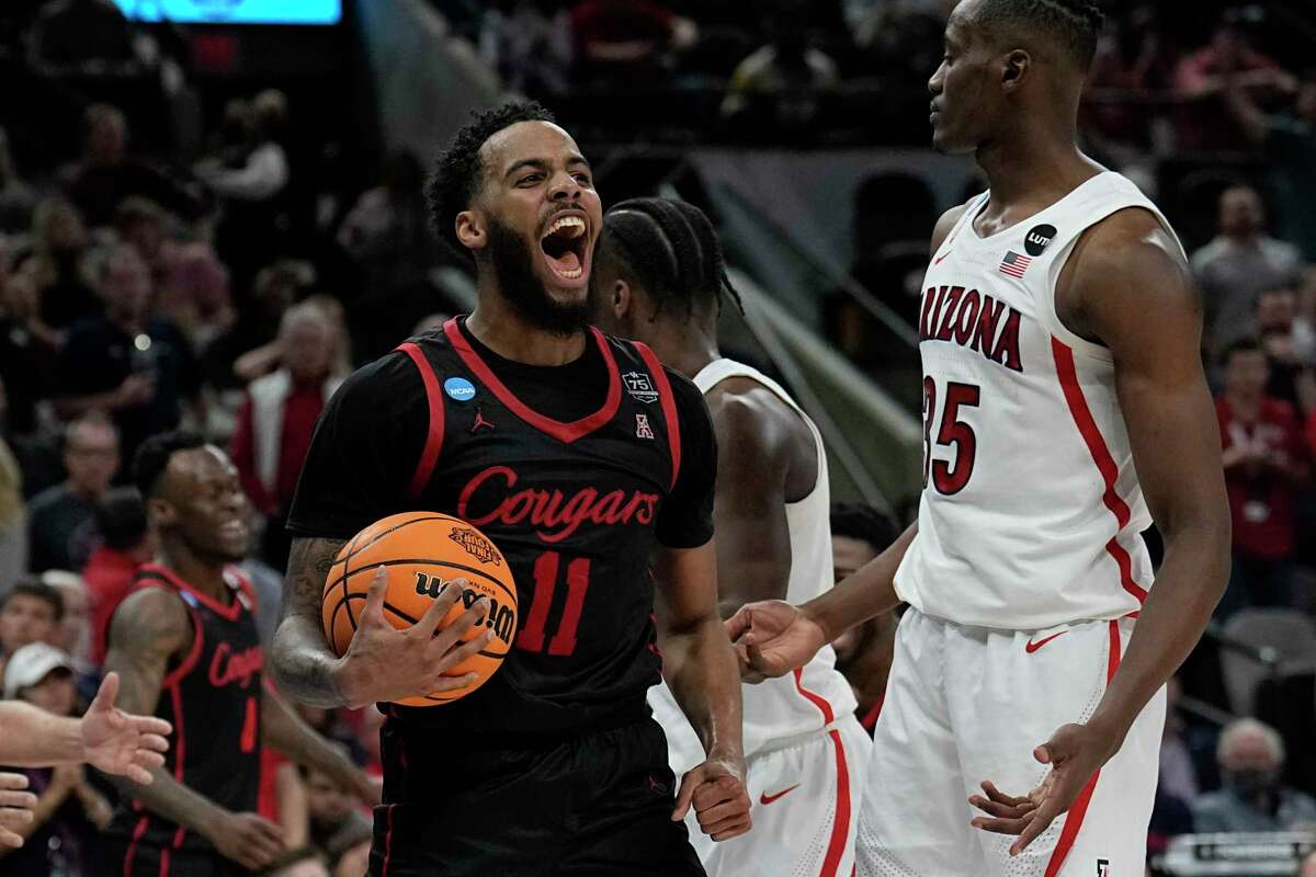 Houston guard Kyler Edwards celebrates after scoring during the second half of a college basketball game against Arizona in the Sweet 16 round of the NCAA tournament on Thursday, March 24, 2022, in San Antonio. (AP Photo/Eric Gay)
