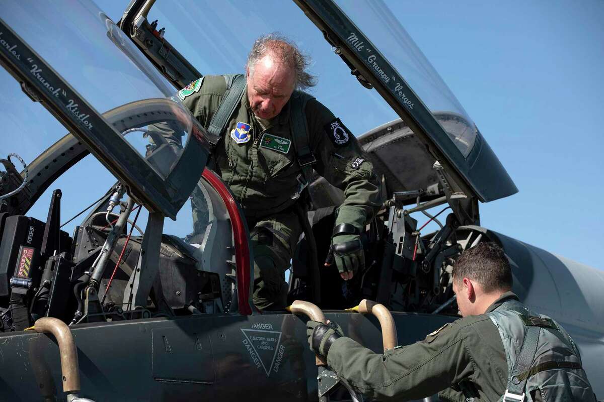 Retired Maj. Theodore “Ted” Sienicki, who was shot down over North Vietnam and was a prisoner of war, climbs out of a T-38C after his cermonial “fini” flight at Joint Base San Antonio-Randolph on Thursday.