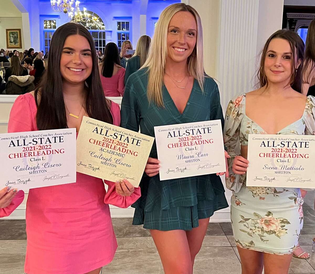 Shelton high cheerleaders Maura Carr, Siena Mattiolo and Caileigh Cisero were honored by the Connecticut High School Coaches Association for making the All -State team for Class L. Cisero was also honored for making the All-Academic team.