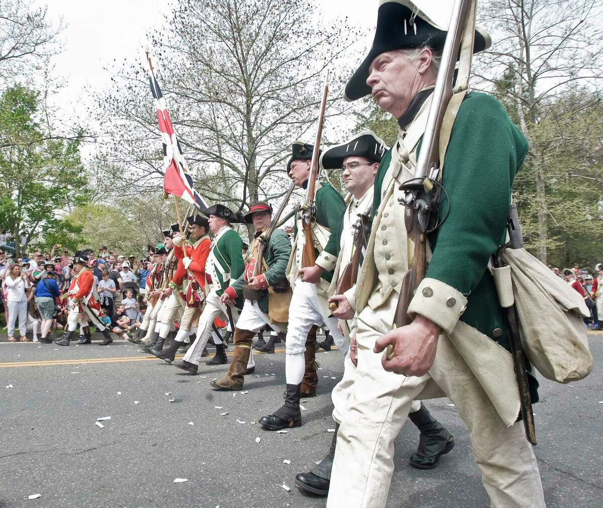 Reenactors march toward Main Street for the 240th anniversary of the Battle of Ridgefield. Saturday, April 29, 2017