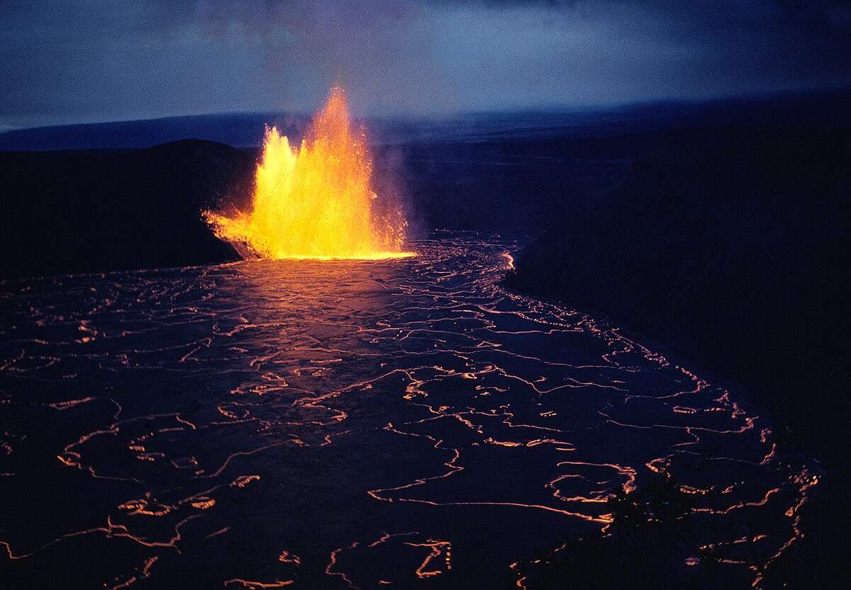 The 1959 eruption of Kilauea Iki as lava flows from the Puupuai vent.