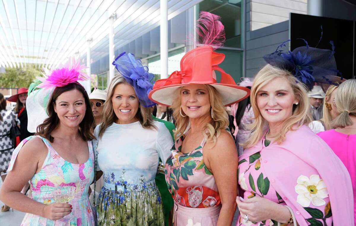 Jayne Johnston, left, Amanda Boffone, Melissa Juneau, and Jennifer Allison, right, are shown during the 13th annual Hats in the Park at the McGovern Centennial Gardens Thursday, March 24, 2022, in Houston.