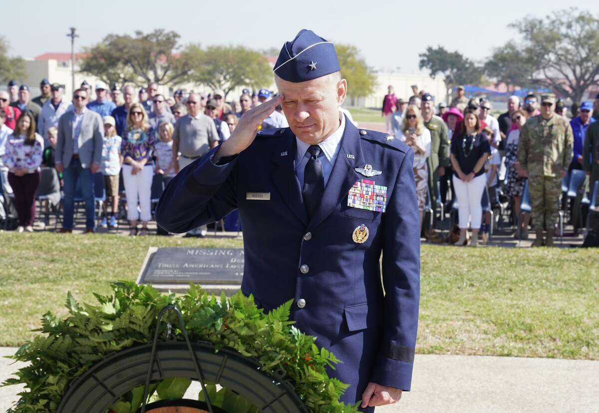 Brig. Gen. Scheid Hodges salutes a wreath to the fallen at the 49th annual Freedom Flyer reunion at Joint Base San Antonio-Randolph on Friday morning.