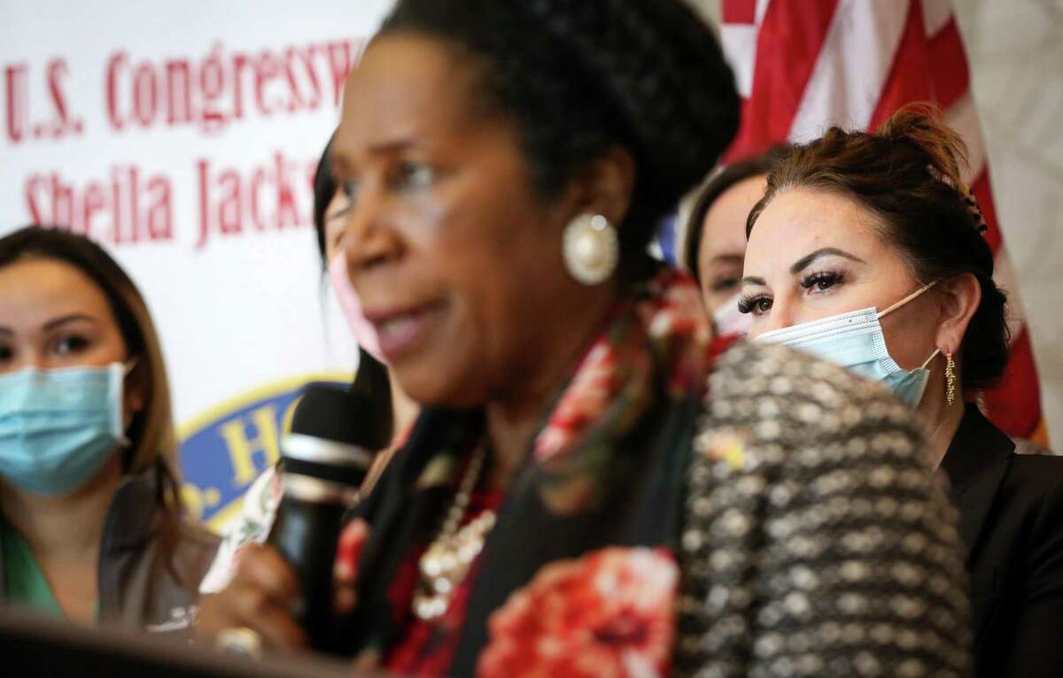 Michelle Ziakas, associate chief nursing officer at St. Joseph Medical Center, listens to U.S. Rep. Sheila Jackson Lee during a press conference about Medicaid reimbursement Friday, March 25, 2022, at the Mickey Leland Federal Building in Houston.