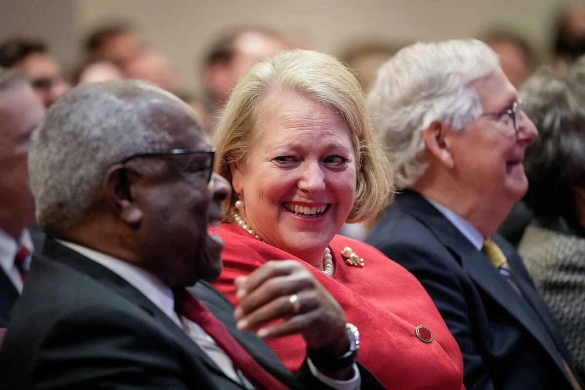 From left to right: Associate Supreme Court Justice Clarence Thomas sits with his wife and conservative activist Virginia Thomas while he waits to speak at the Heritage Foundation on Oct. 21, 2021, in Washington, DC. (Drew Angerer/Getty Images/TNS)