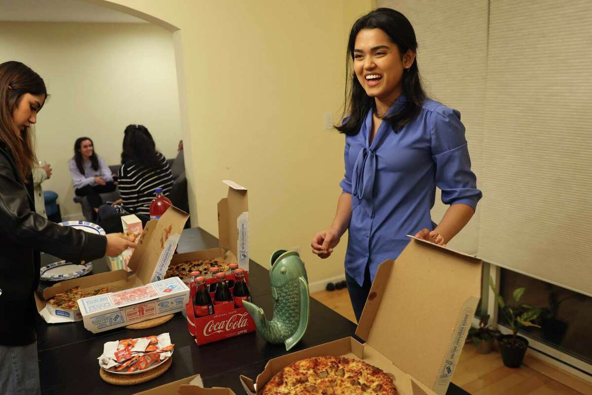 Sumana Kaluvai hosts a pizza night with her friends and fellow activists in San Francisco. Kaluvai is the founder of the Hidden Dream, which advocates for the children of visa holders who are losing their protected immigration status as they turn 21.