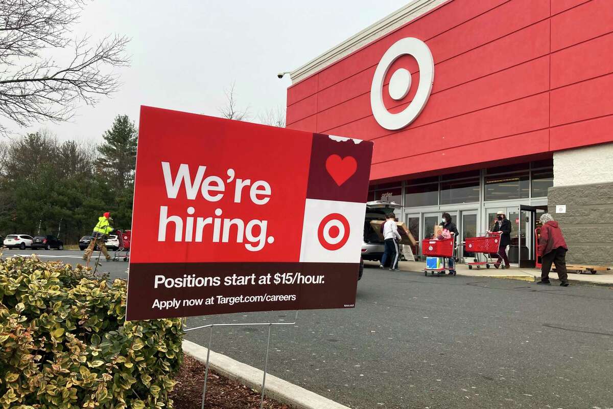 A hiring sign is in front of a Target store in Manchester, Connecticut, on Tuesday, November 39, 2021. (AP Photo/Ted Shaffrey)