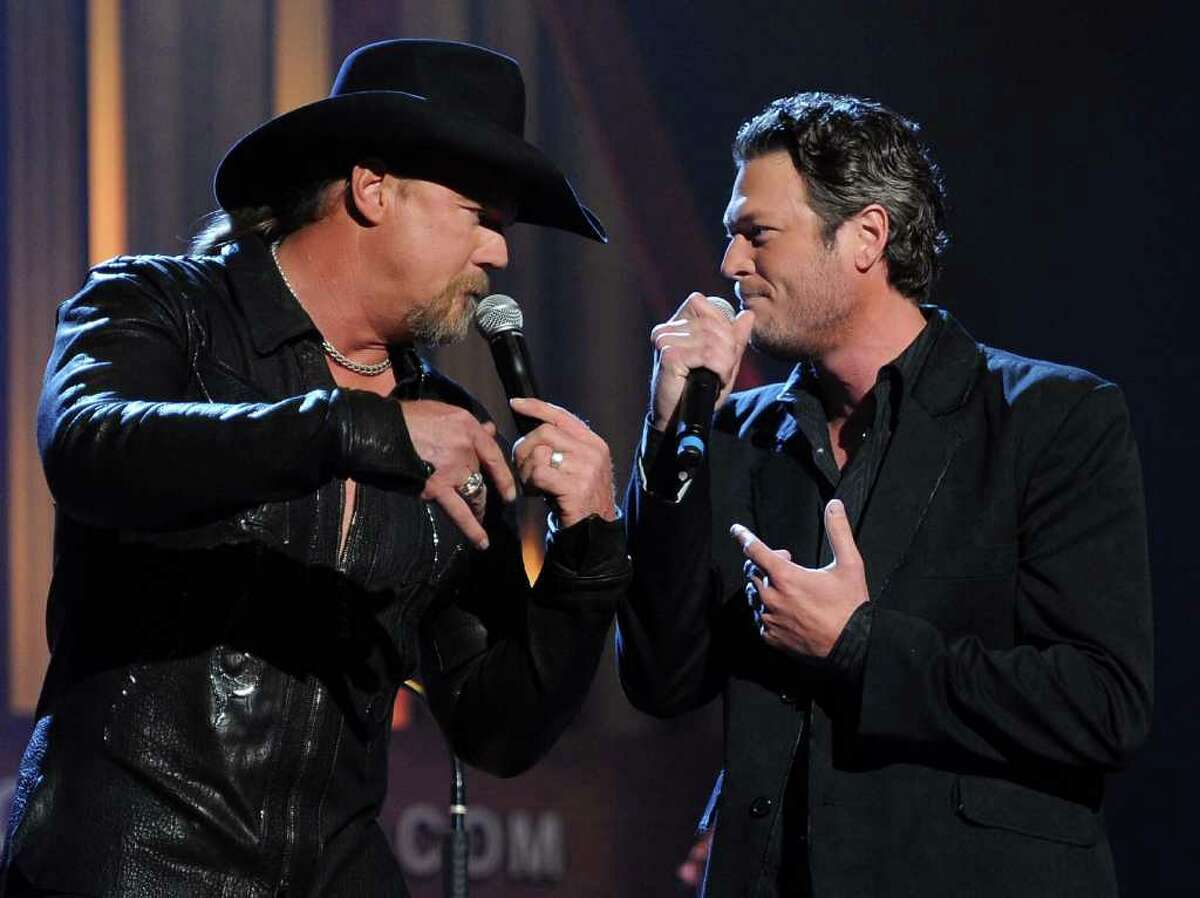 NASHVILLE, TN - SEPTEMBER 28: Recording Artists Trace Adkins and Blake Shelton perform during Country Comes Home: An Opry Celebration at the Grand Ole Opry House on September 28, 2010 in Nashville, Tennessee. The Grand Ole Opry House has been restored following damage sustained during flooding in May 2010. (Photo by Rick Diamond/Getty Images) *** Local Caption *** Trace Adkins;Blake Shelton