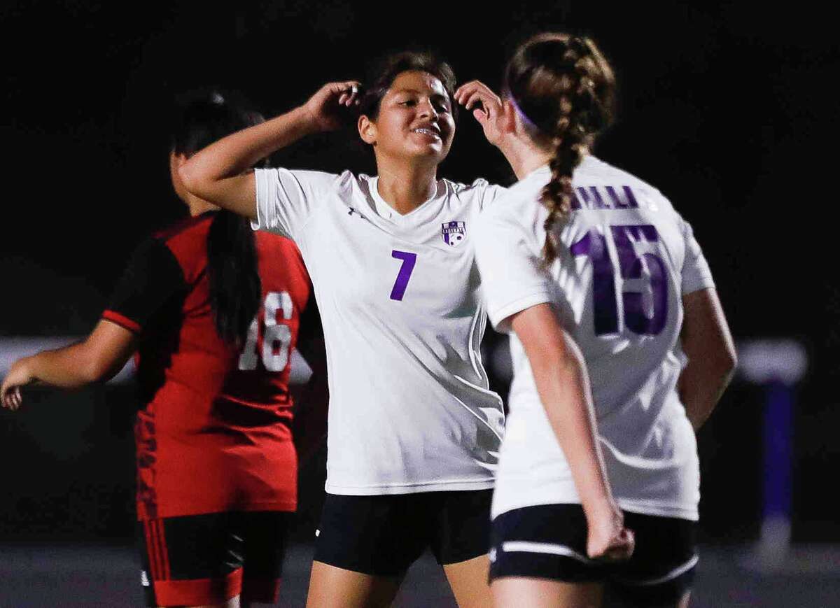 Willis' Chelsea Mentado (7) reacts after missing a shot on goal during the first period of a Region II-6A bi-district high school soccer match at Grand Oak High School, Friday, March 25, 2022, in Spring.