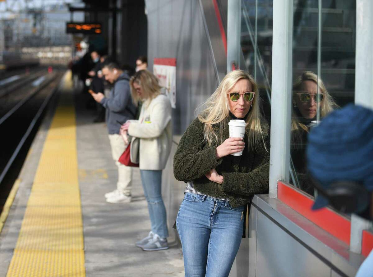 Metro North passengers during rush hour in March 2022 in Stamford, Conn. As employers look to bring more people back to the office, a new survey suggests four in 10 could look for new jobs this year if they lose some or all of their remote working allowances.
