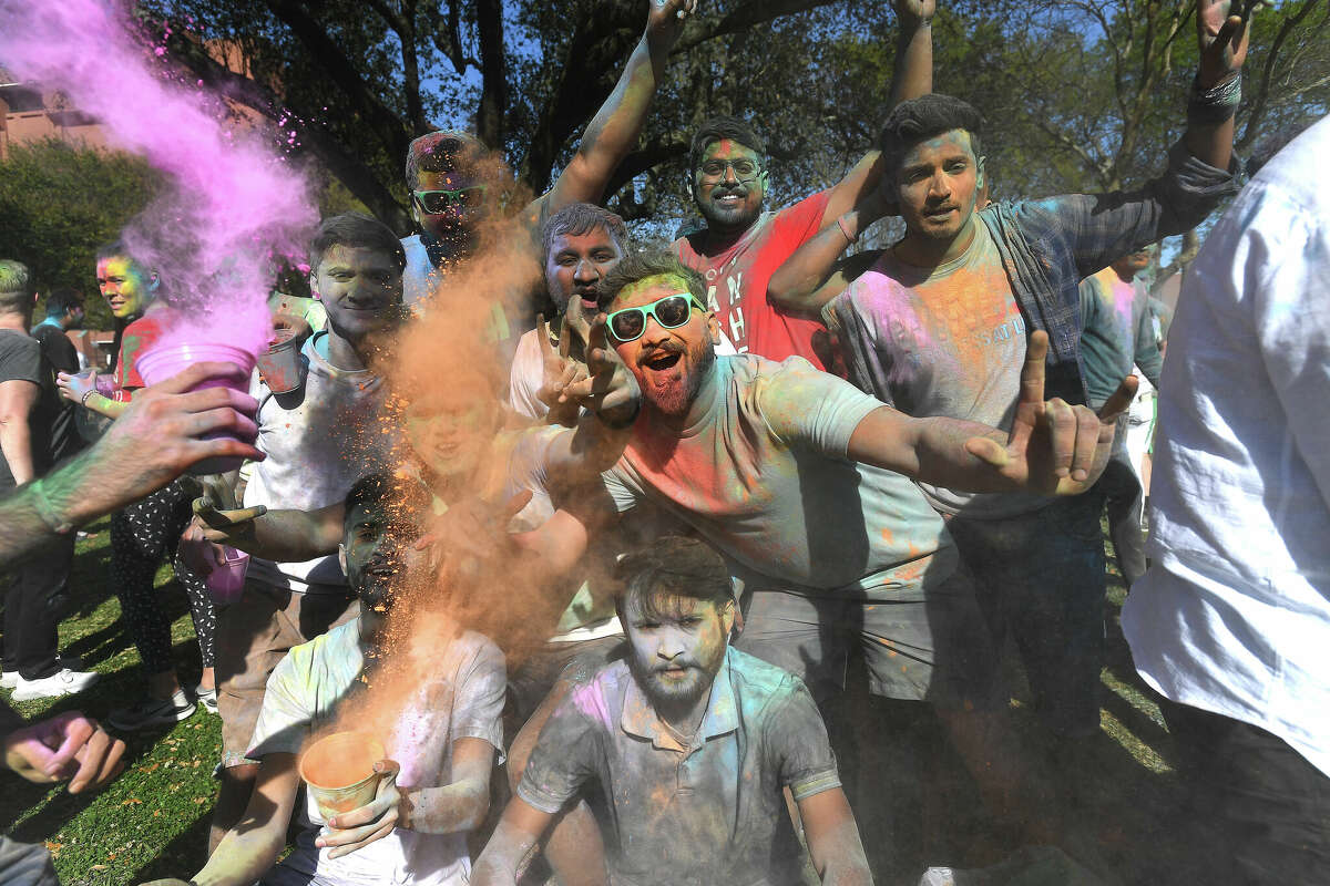 Lamar University students gather on the dining hall lawn to celebrate one of India's most popular festivals - Holi - which celebrates the arrival of spring with music and a color bash. Traditional foods were also made for the celebratory event and free to all joining in or observing the festivities. The LU International Student Council first held a Holi fest in 2019 and have continued the tradition since. Of Lamar's more than 700 international students, roughly 500 are from India and Nepal, said Mustapha Jourdini, Executive Director of International Education and Services. Photo made Friday, March 25, 2022 Kim Brent/The Enterprise