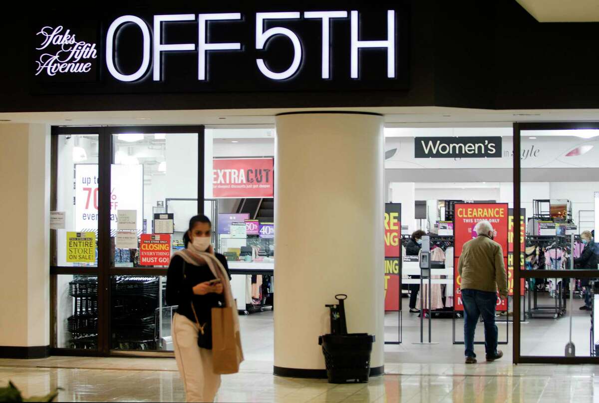 Shoppers frequent the Saks Off 5th store at Stamford Town Center on Black Friday on Nov. 26, 2021. Saks Off operated at the mall from June 2015 to December 2021. 