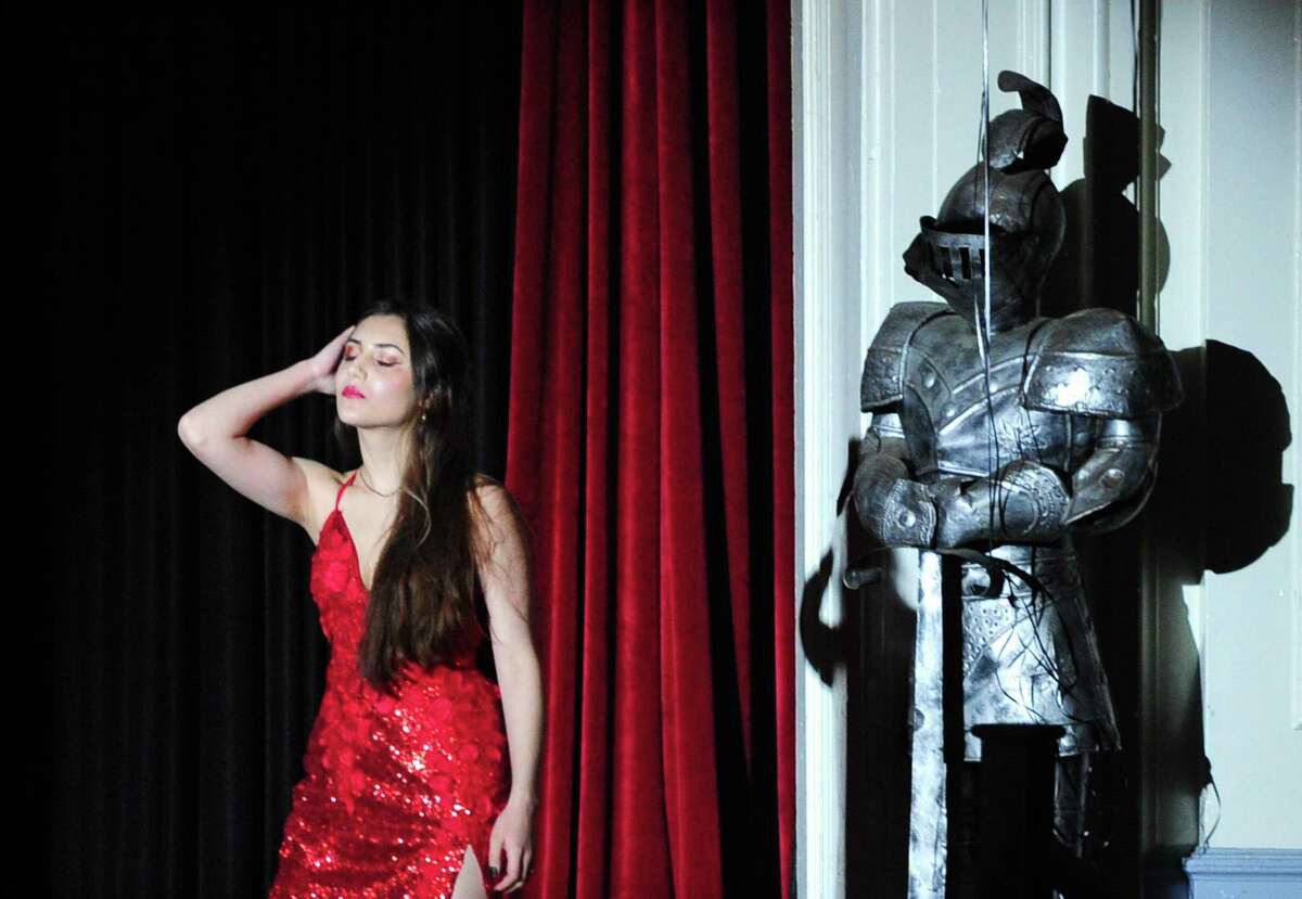 Stamford High School senior Ana Clara Mesquita models a prom dress during the school's 34th annual