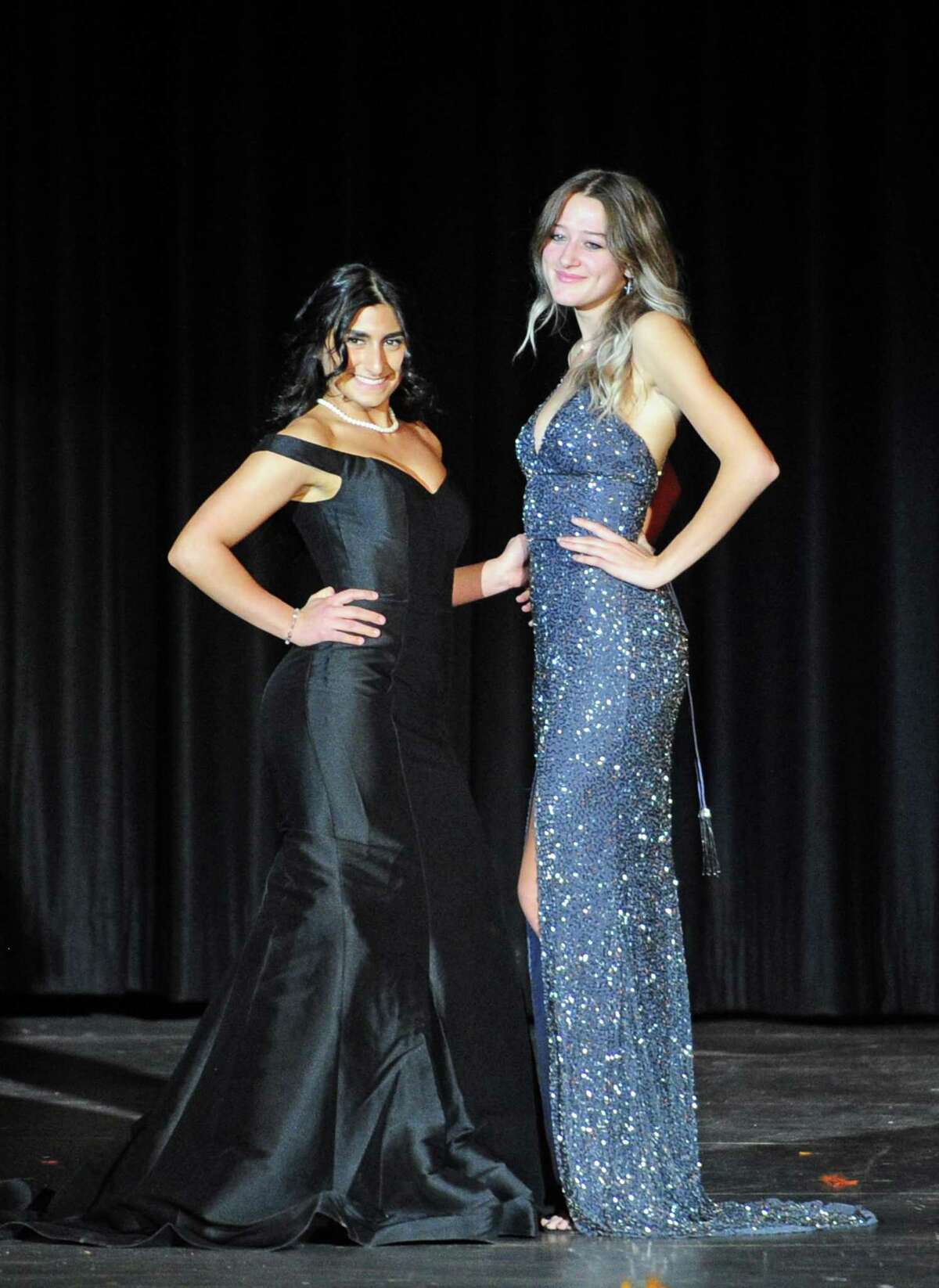 Stamford High School seniors Lucy Santora, left, and Karina Zaleski model prom fashion during the school's 34th annual
