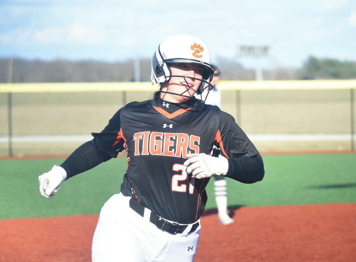 Edwardsville's Lexie Griffin cracks a smile as she rounds third base after hitting a two-run home run in the fourth inning against Breese Central on Friday in Edwardsville.