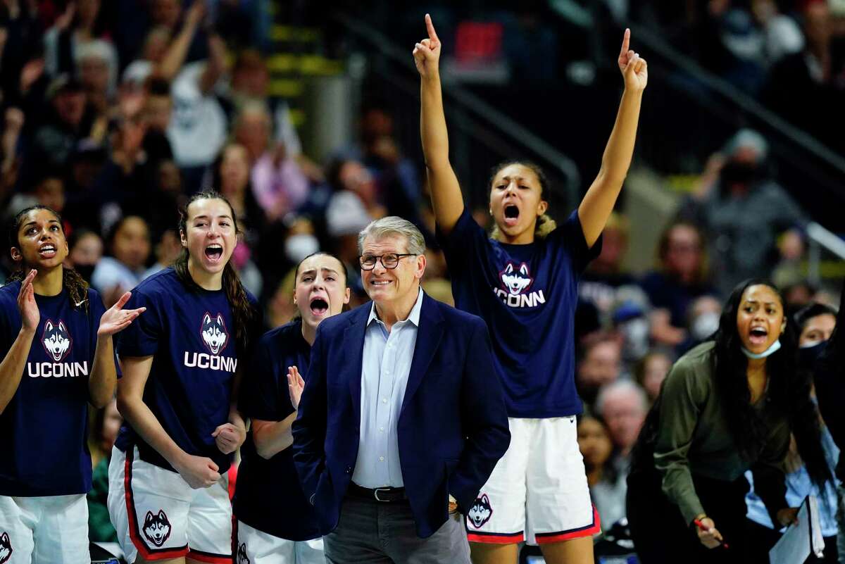 Connecticut players and head coach Geno Auriemma react during the first quarter of a college basketball game against Indiana in the Sweet Sixteen round of the NCAA women's tournament, Saturday, March 26, 2022, in Bridgeport, Conn. (AP Photo/Frank Franklin II)