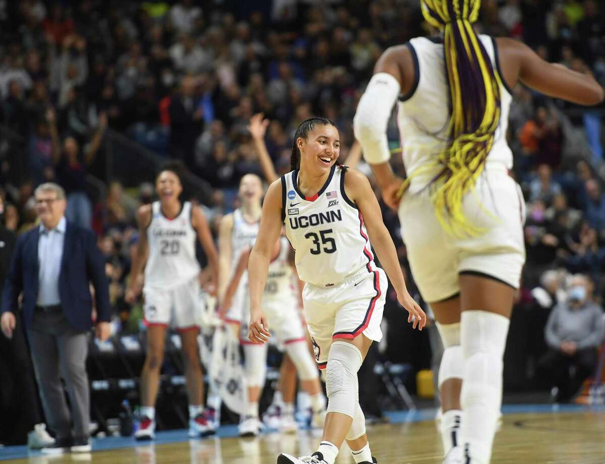 UConn’s Azzi Fudd smiles following a made basket during her team’s defeat of Indiana on Saturday in the Sweet 16.