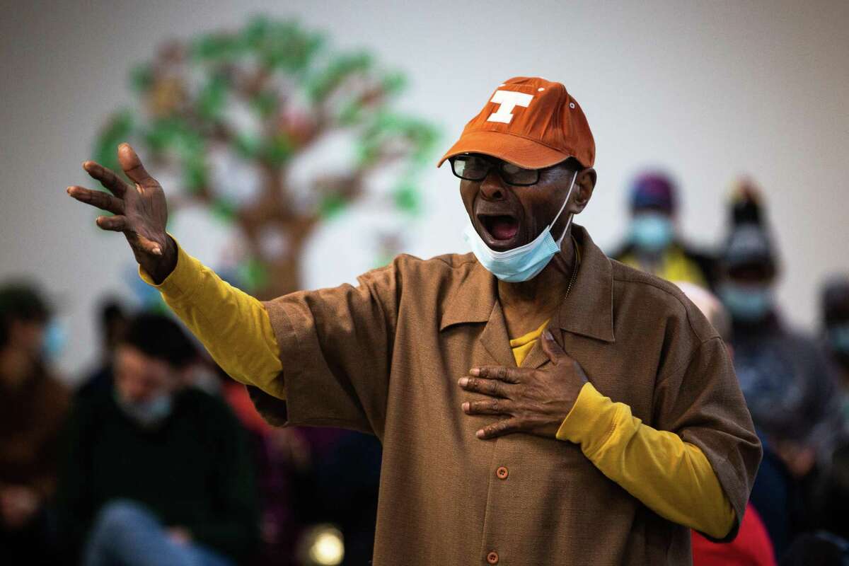 Preston Williams sings his heart out during a praise and worship service at Caregiver Inc., which provides long-term care services to individuals with disabilities, Wednesday, March 16, 2022, in Sugar Land.