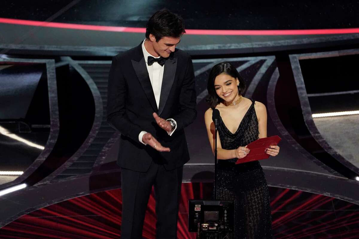 Jacob Elordi, left, and Rachel Zegler present the award for best visual effects at the Oscars on Sunday, March 27, 2022, at the Dolby Theatre in Los Angeles.