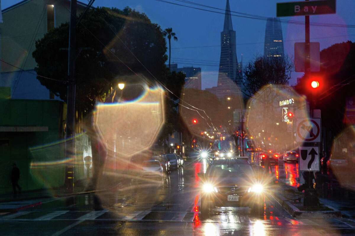 Columbus Avenue on a rainy Sunday evening. After a dry, sunny Saturday, the Bay Area transitions into a wet weather on Sunday night, March 27, 2022.