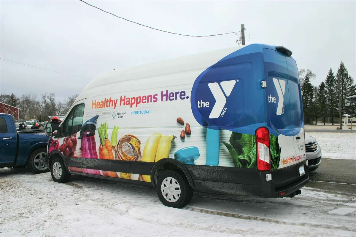 The WMCA/Spectrum Health Veggie Van visited the Mecosta County fairgrounds this past Saturday, distributing fresh produce and canned goods to those willing to wait in line in the bitter cold.