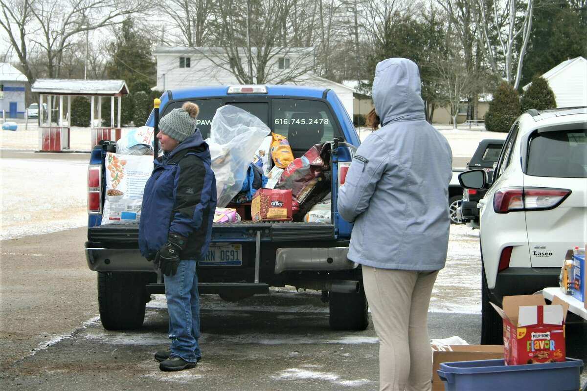 The WMCA/Spectrum Health Veggie Van visited the Mecosta County fairgrounds this past Saturday, distributing fresh produce and canned goods to those willing to wait in line in the bitter cold.