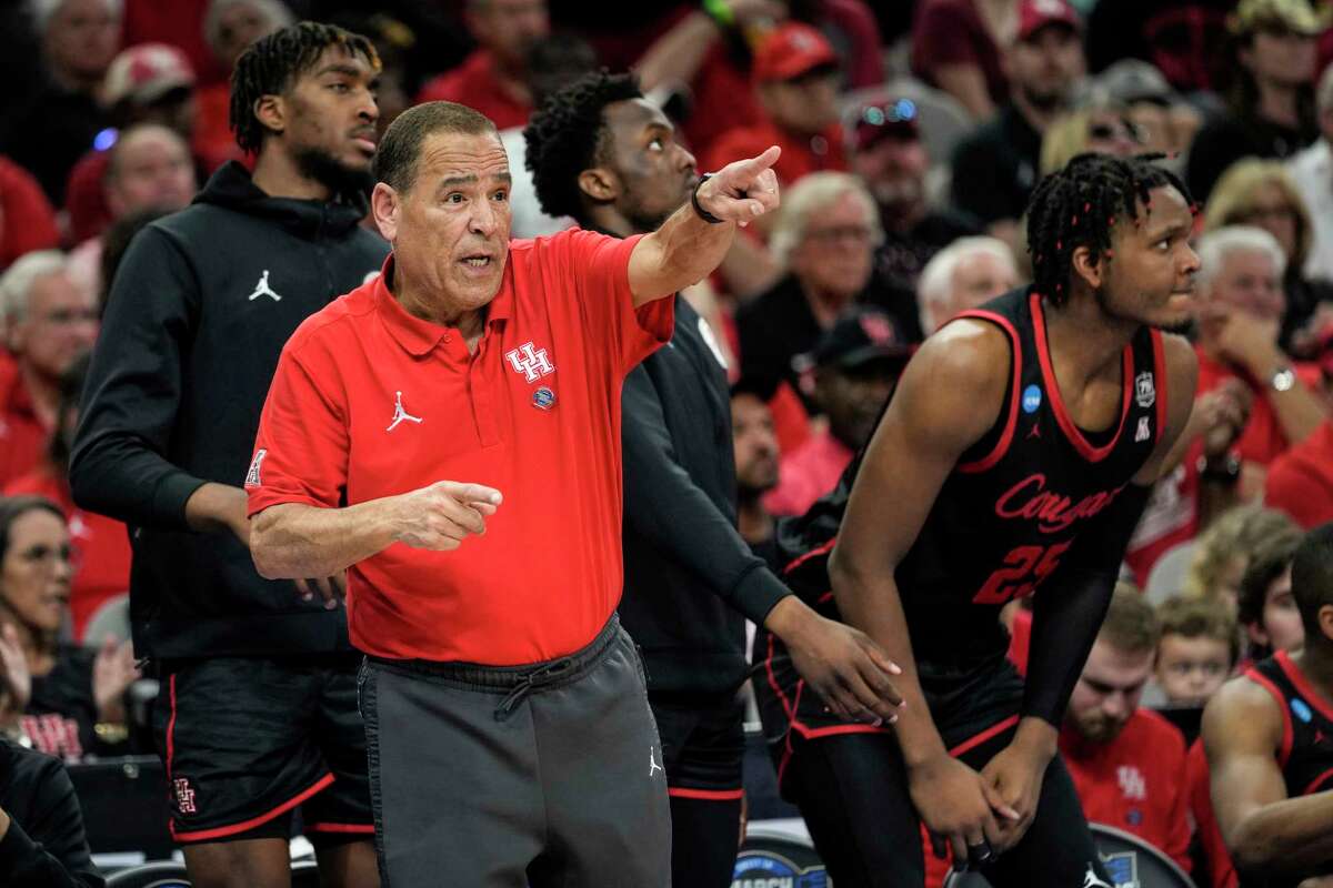 Houston head coach Kelvin Sampson guides his team during the second half of an NCAA South Region men’s basketball final Saturday, March 26, 2022 in San Antonio. Villanova eliminated the Cougars with a 50-44 win, with the Wildcats advancing to the Final Four.