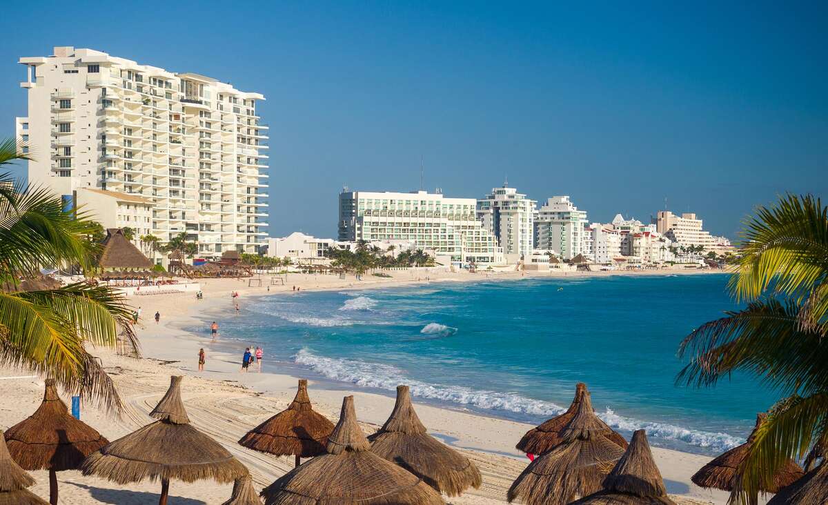 FILE -- Resort hotels line the beach in Cancun, Mexico.