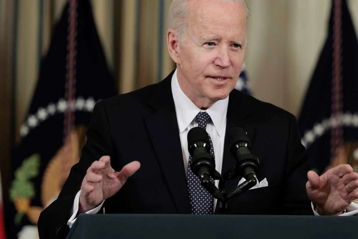 President Biden answers questions after introducing his budget request for fiscal year 2023 in the State Dining Room of the White House. Part of Biden’s proposal includes a new minimum tax on billionaires and other wealthy Americans.
