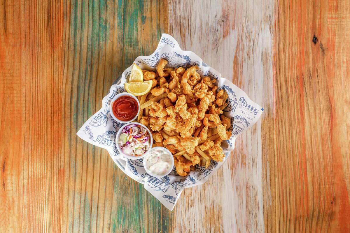 Willie's Grill & Icehouse restaurants offer a basket of fried tails and fries served with cocktail and tartar sauces and lemon wedges.